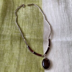 Elegant Silver and Amber Pendant Necklace